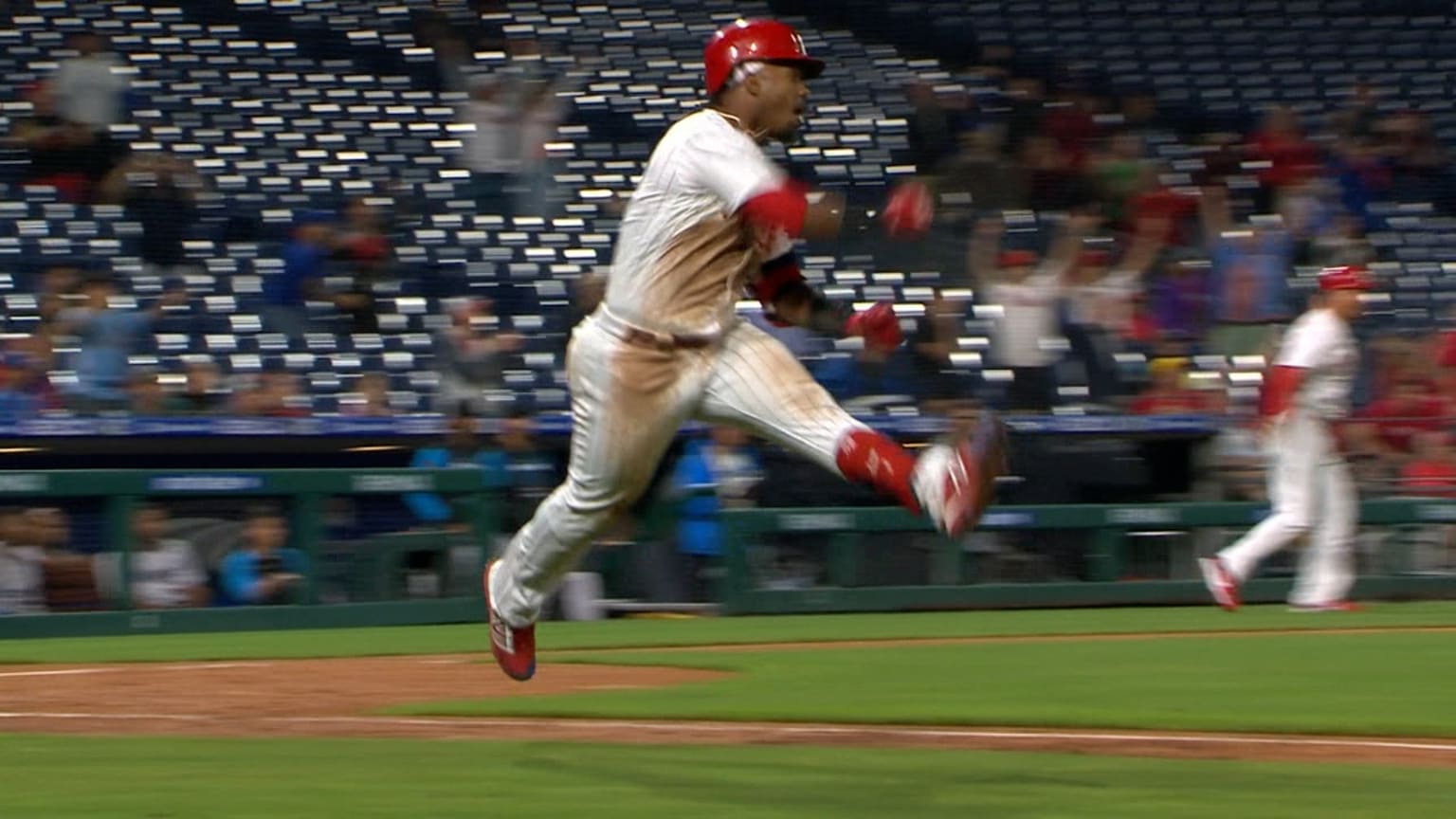 Phillies shortstop Jean Segura exits after taking fastball off