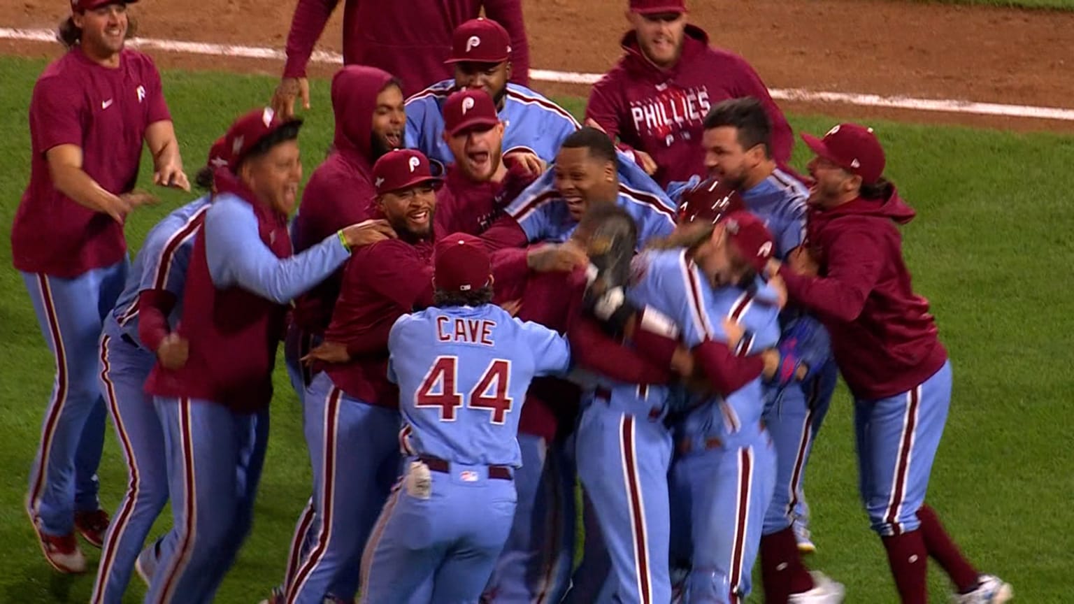 Phillies fans pose with 2022 NLCS trophy in Clearwater