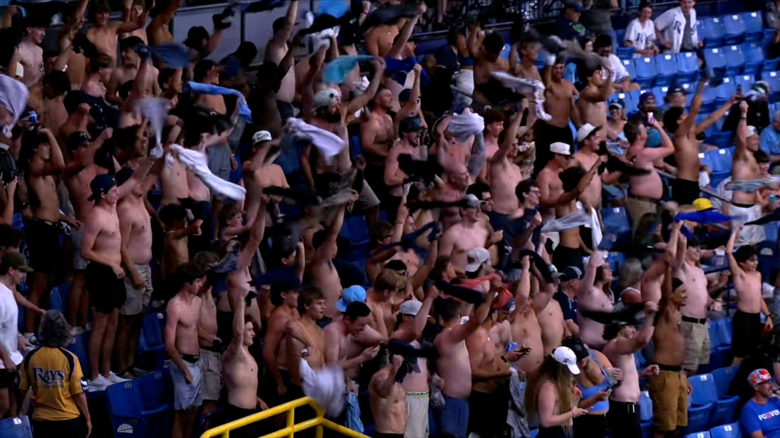 Actual Tampa Bay Rays Tarps Off fans at Tropicana Field waving their shirts overhead during a May 19, 2026 game