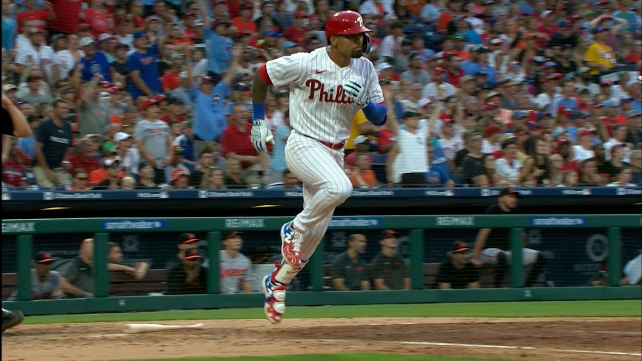 Edmundo Sosa #33 of the Philadelphia Phillies reacts after hitting a solo  home run during the eighth inning.
