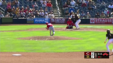 Marcos Castañon scores on a wild pitch 