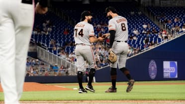 Ryan Walker tosses glove to first to record the out
