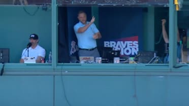 C. J. Nitkowski catches a foul ball in the booth
