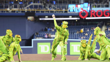 Group of crickets throw out first pitch in Toronto
