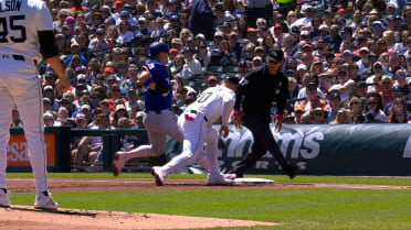Josh Jung safe at first base after a review 