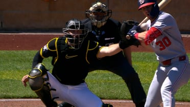 Jacob Young gets hit by a pitch to tie the game