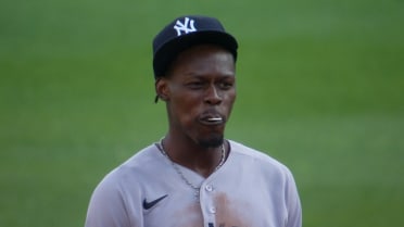 Jazz Chisholm Jr. eats lollipop while playing second