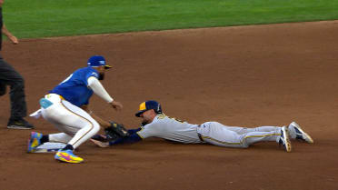 Willi Castro tags out Brice Turang after a review