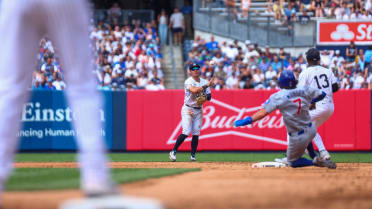 Swanson reaches after Cubs' successful challenge