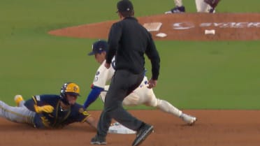 Isaac Collins steals second base