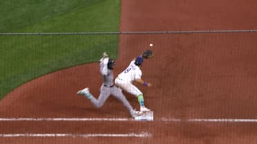 Jazz Chisholm Jr. is safe at first after review