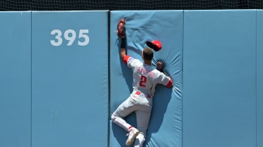 Justin Crawford crashes into the wall for the catch