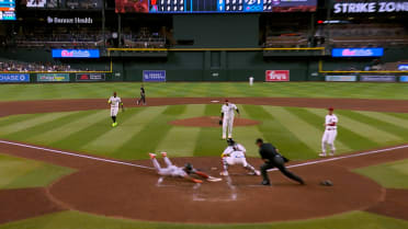 Victor Bericoto scores on a fielder's choice