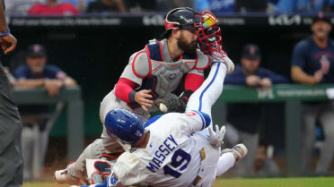 Masataka Yoshida throws out Michael Massey at home