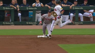 Austin Riley beats out double play after review
