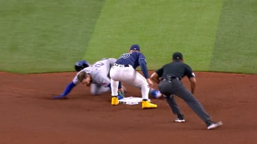 Jared Walsh is safe at second after review