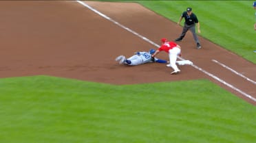 Reds challenge safe call on a pickoff play 