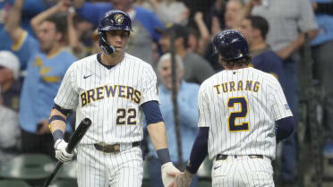 Brice Turang scores on throwing error