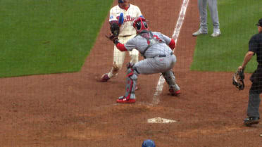 Masyn Winn throws out Bryson Stott at the plate