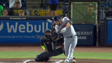 David Fry fouls a ball off his helmet
