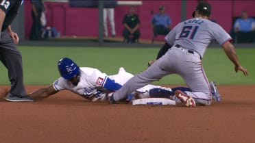 Dairon Blanco steals second after review