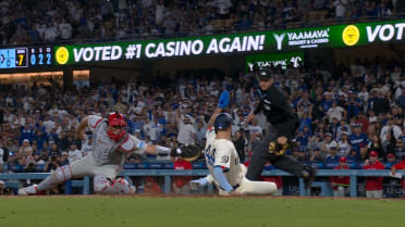 Andy Pages safe at home after replay review