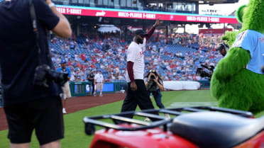 Jaylen Brown throws out the first pitch