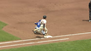 Mike Yastrzemski is safe at first