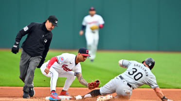 Robbie Grossman steals second base after review
