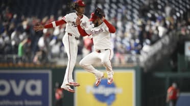 Nationals turn game-ending double play after review