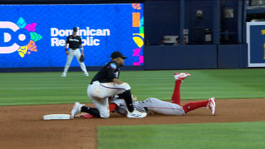 Eli White caught stealing second base after challenge