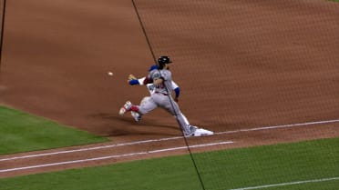 Eugenio Suárez safe at first after review