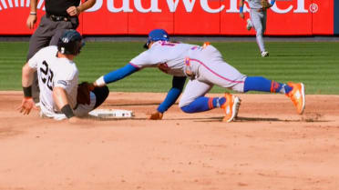 Mets turn inning-ending double play after review