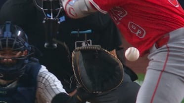 Zach Neto is hit by a pitch after review