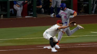 Tyrone Taylor safe at first after review