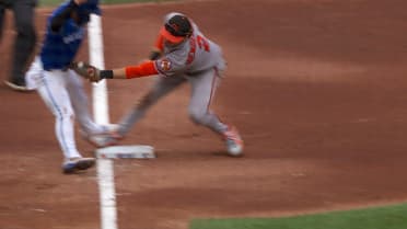Andrés Giménez out at third after review