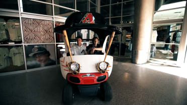 Bat Boys hop in the D-backs golf cart
