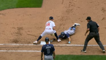 Jake Mangum ruled safe after close tag at first base
