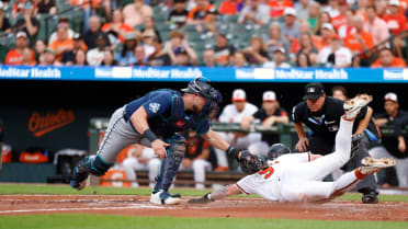 Cole Young nabs Tyler O'Neill at home after review