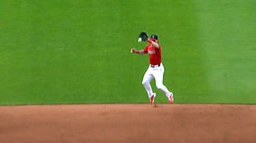 Travis Bazzana fields, underhands to second base