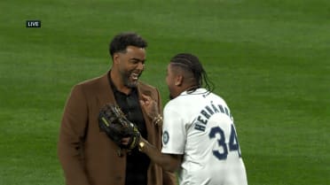 Nelson Cruz throws out first pitch to King Félix