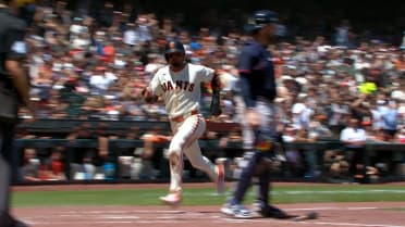 Luis Arraez scores on a throwing error