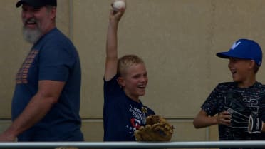 A fan makes a great catch on a foul ball