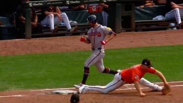 Eli White out at first after review