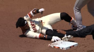 Luis Matos safe at second after challenge
