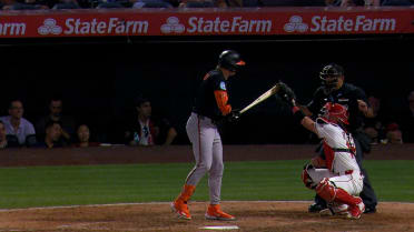 Heston Kjerstad fouls off a ball after review