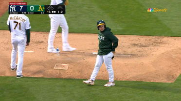 Ballboy makes foul catch in left