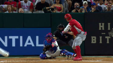 Tyler O'Neill walks in a run