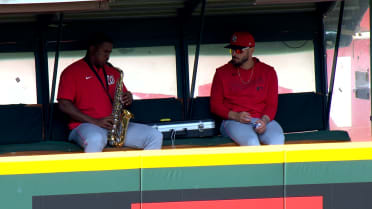 Jose A. Ferrer plays the saxophone pregame