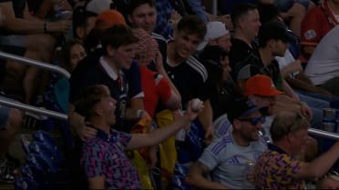 Scottish fans catch foul ball
